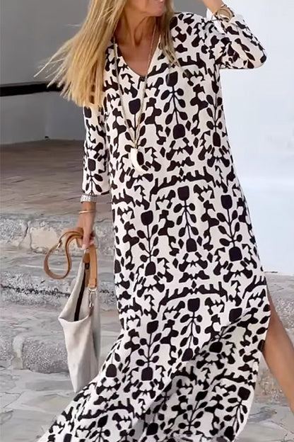 Vestido largo de manga larga con escote en V holgado y estampado de moda ibicenca