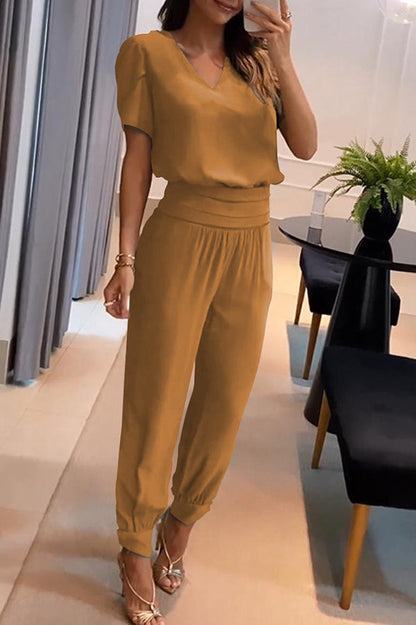 Conjunto de top con mangas abullonadas y pantalón de cintura alta con bolsillos y puños Jemma