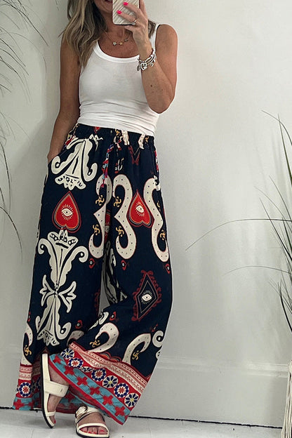 Pantalones con cintura elástica y cordón ajustable con bolsillos y estampado de Reina de Corazones