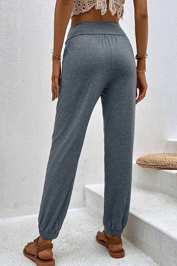 Pantalones casuales de cintura alta con bolsillos sueltos y temperamento