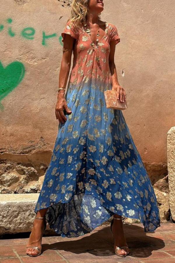 Vestido largo Evaluna con estampado de flores doradas en degradado tie-dye y manga corta