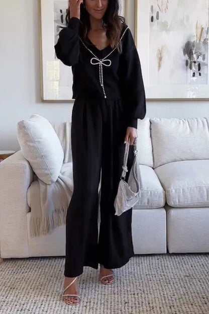 Suéter con lazo elegante