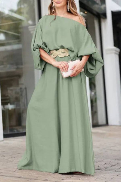 Conjunto de top con mangas farol y cuello al bies y pantalones de pierna ancha 