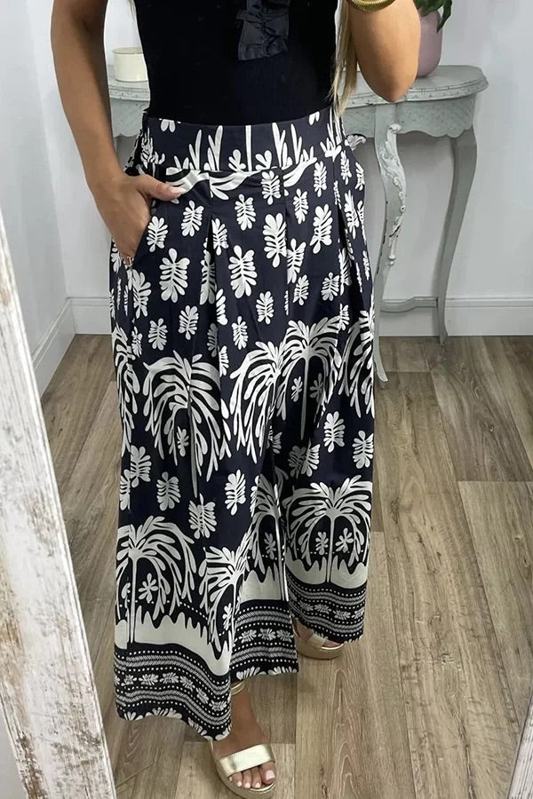 Pantalones anchos de pierna para vacaciones con bolsillo suelto y cintura elástica con estampado único