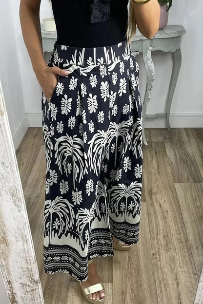 Pantalones anchos de pierna para vacaciones con bolsillo suelto y cintura elástica con estampado único
