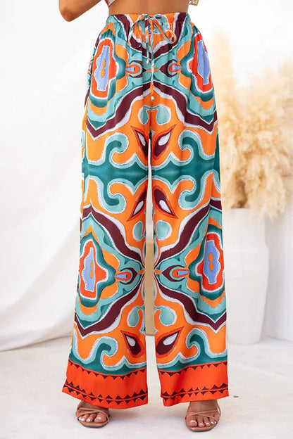 Pantalones anchos con bolsillos y cintura elástica con estampado abstracto étnico de satén Oh So Chic