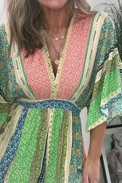 Mono holgado de pierna ancha con bolsillos y mangas acampanadas con estampado floral retro de Last Queen