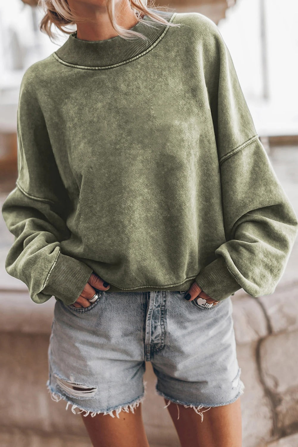 Sudadera lavada con hombros caídos