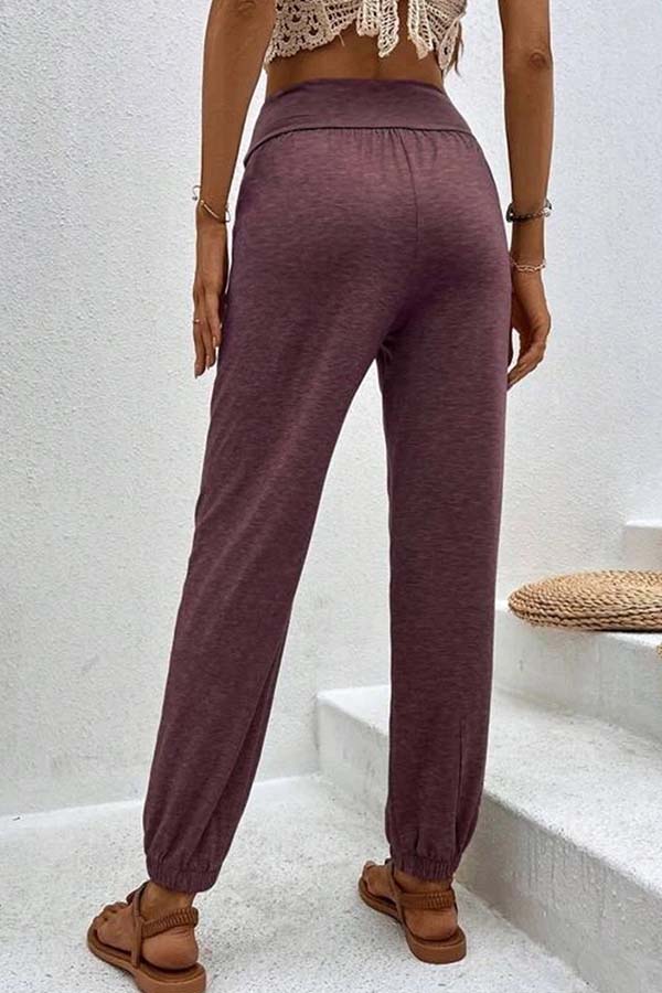 Pantalones casuales de cintura alta con bolsillos sueltos y temperamento