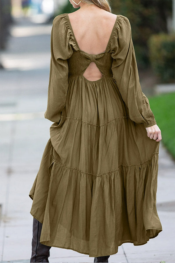 Vestido largo escalonado con volantes, escote en V y lazo