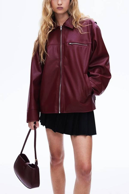 Chaqueta de cuero con solapa, manga larga, bolsillo y cremallera
