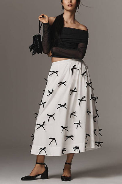 Falda midi con lazos