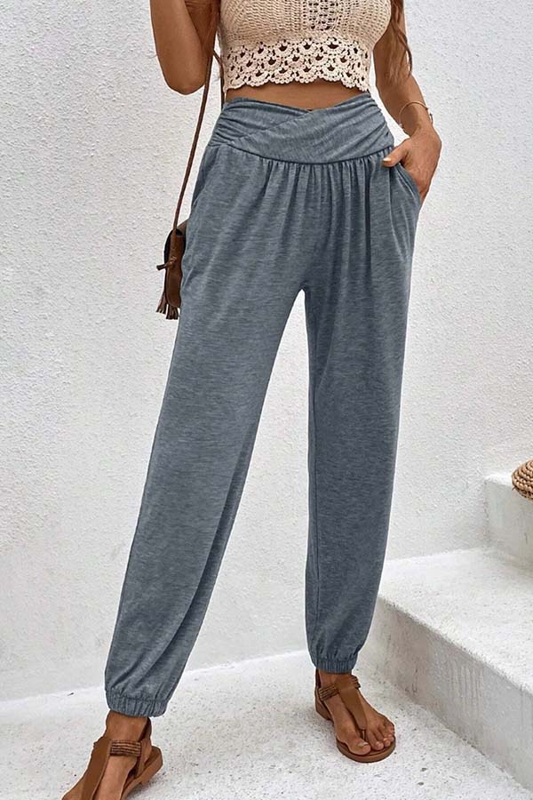 Pantalones casuales de cintura alta con bolsillos sueltos y temperamento