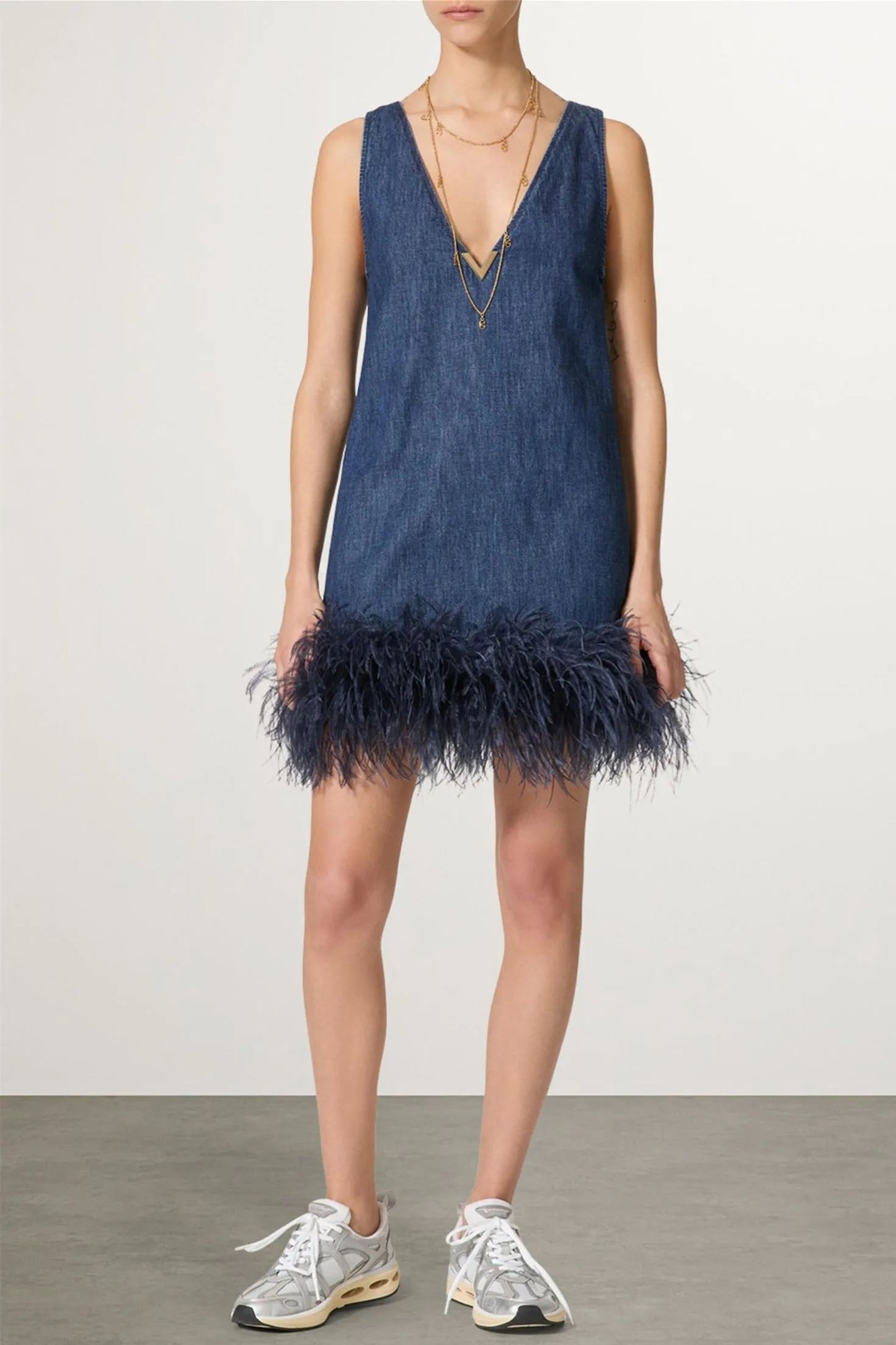 Minivestido vaquero con ribete de plumas Setlla 