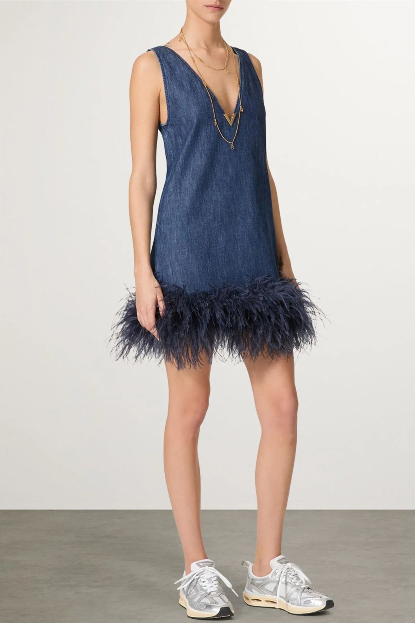 Minivestido vaquero con ribete de plumas Setlla 