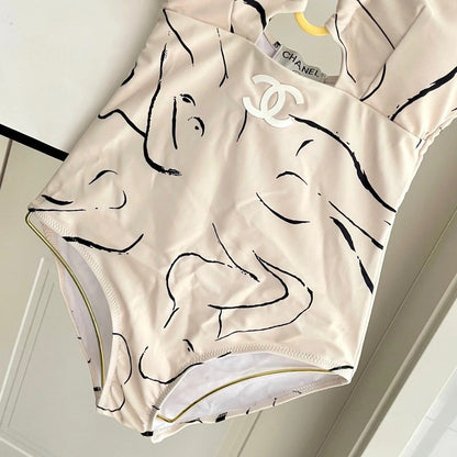 CC BIKINI SWIMSUIT SET IN CREAMY WHITE MIXED WITH CURVED BLACK DETAIL 608919