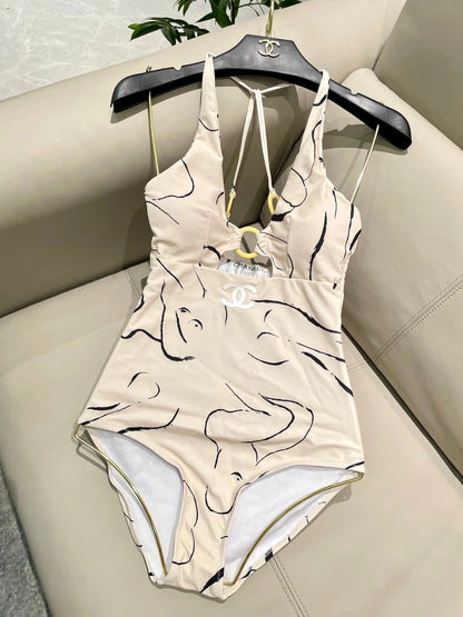 CC BIKINI SWIMSUIT SET IN CREAMY WHITE MIXED WITH CURVED BLACK DETAIL 608919