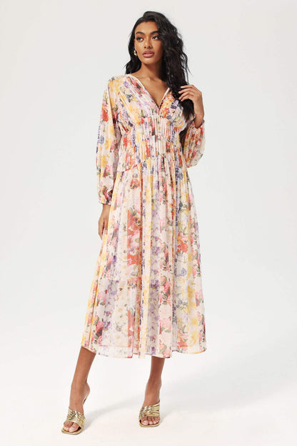 Vestido midi floral con cuello en V y mangas farol 