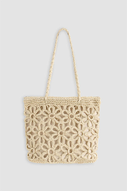 Bolso de paja con diseño hueco 