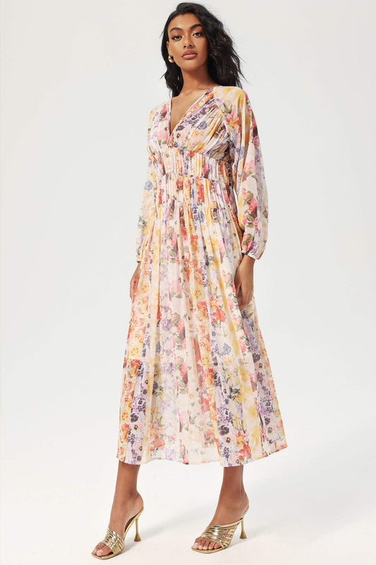Vestido midi floral con cuello en V y mangas farol 
