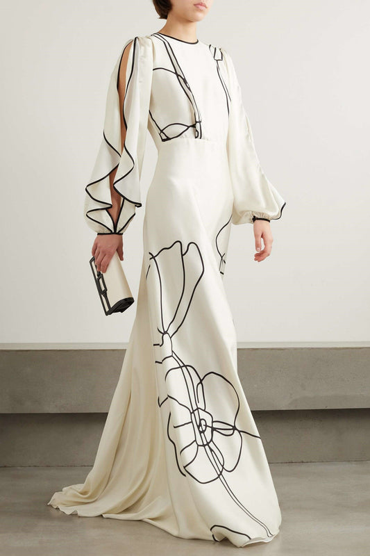 Vestido largo de satén con estampado floral y volantes 