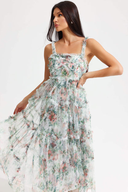 Vestido midi verde con volantes y cintura cónica con estampado floral 