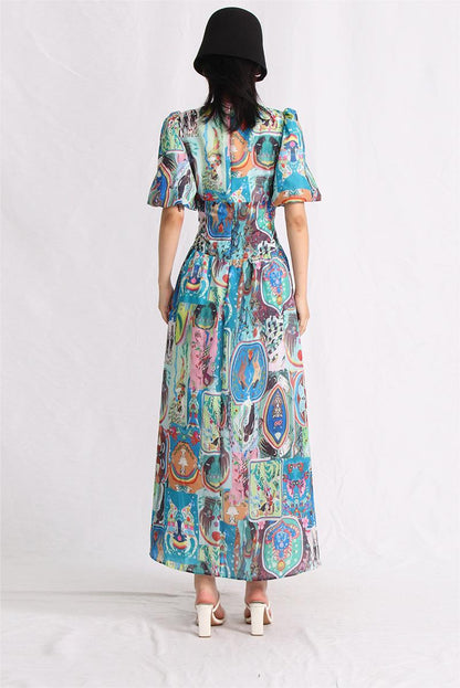 Vestido largo estampado con mangas abullonadas, escote en V y hebilla 