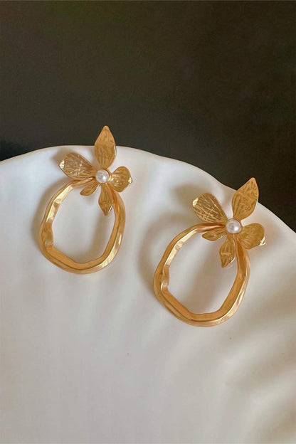 Pendientes geométricos irregulares con perlas y flores 