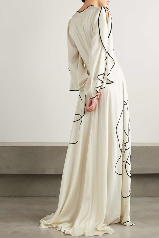Vestido largo de satén con estampado floral y volantes 