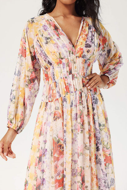 Vestido midi floral con cuello en V y mangas farol 