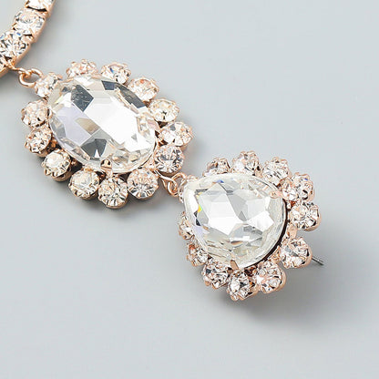 Gold Triple Drop Earrings with Luxury Gem Detail and Crystal Embellishments