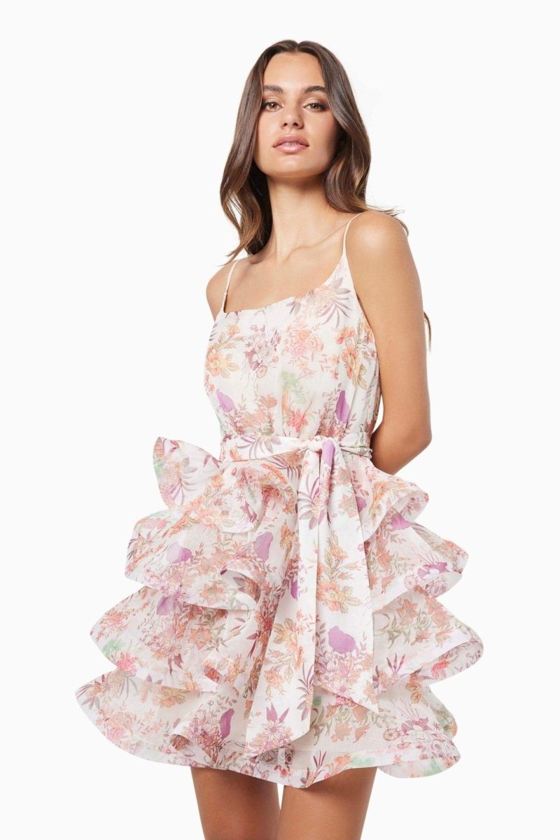 Vestido mini con volantes y estampado floral de Monica 