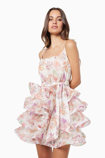 Vestido mini con volantes y estampado floral de Monica 