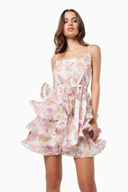 Vestido mini con volantes y estampado floral de Monica 