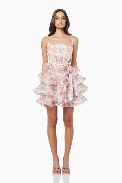 Vestido mini con volantes y estampado floral de Monica 