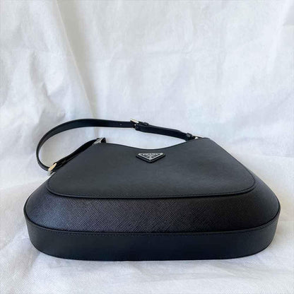 Prada triangle logo cleo bag in saffiano black leather