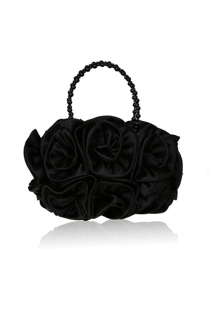 Bolso de mano con rosetas de satén y perlas 