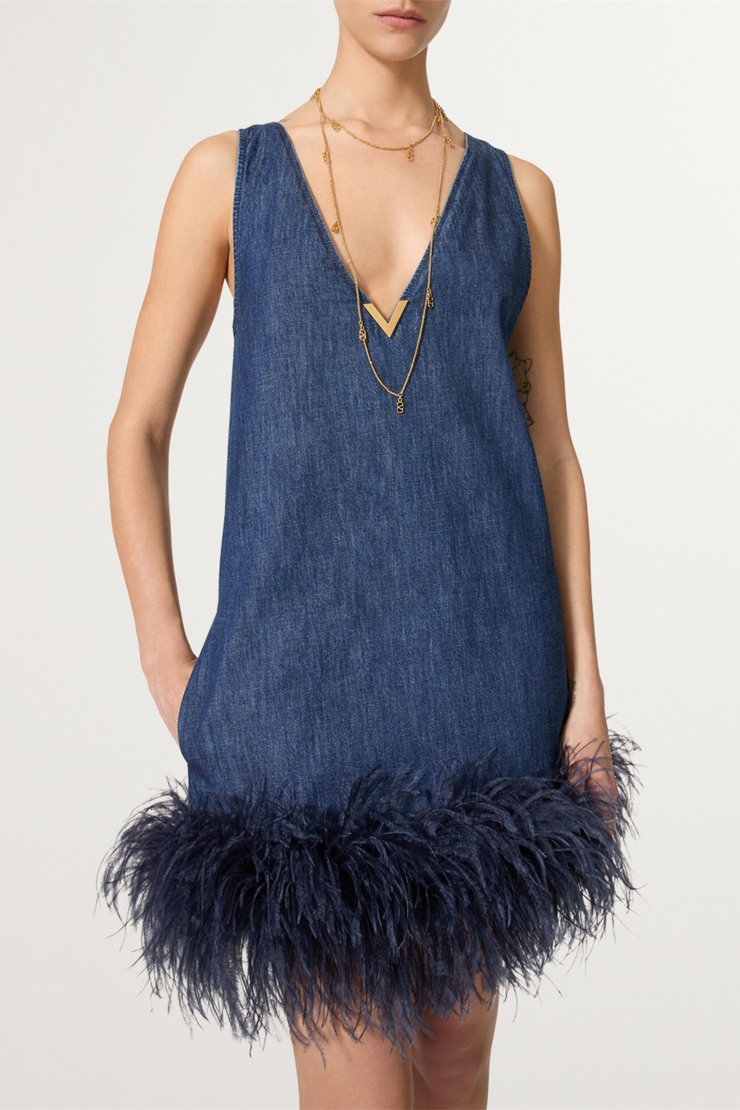 Minivestido vaquero con ribete de plumas Setlla 