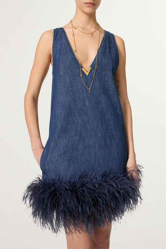 Minivestido vaquero con ribete de plumas Setlla 